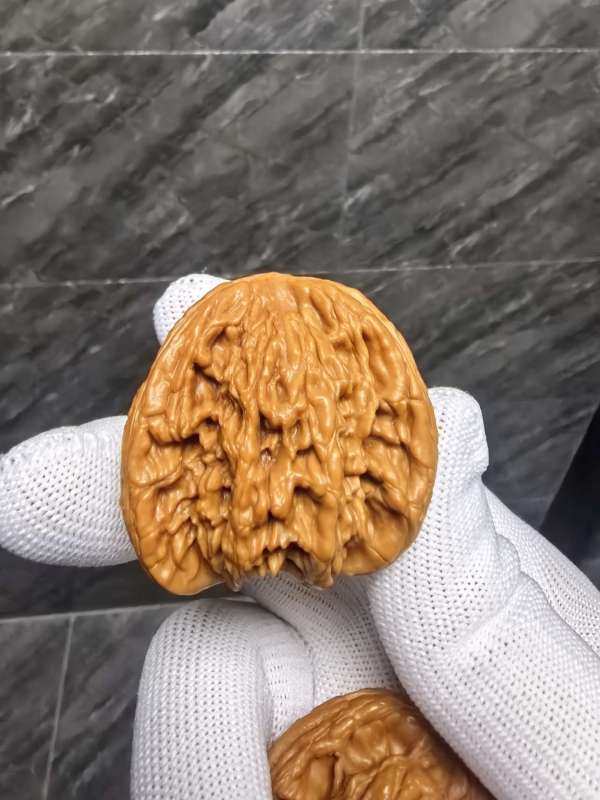 古玩雜項桃核虎頭奔真品鑒賞圖